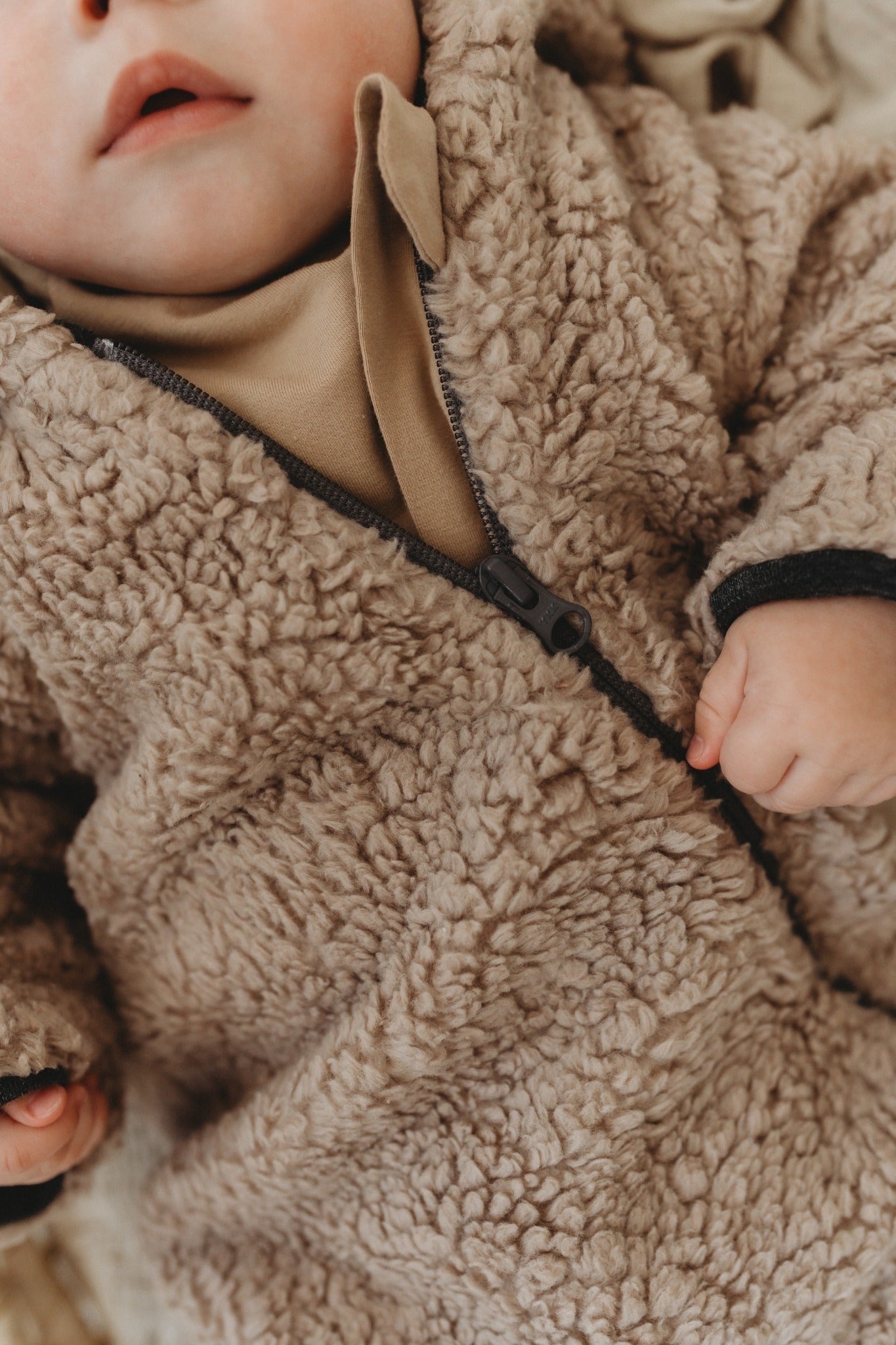 Breden Merinovilla vauvan haalari beige